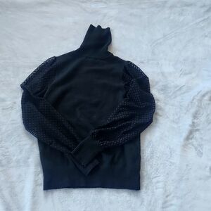 Black turtleneck sweater